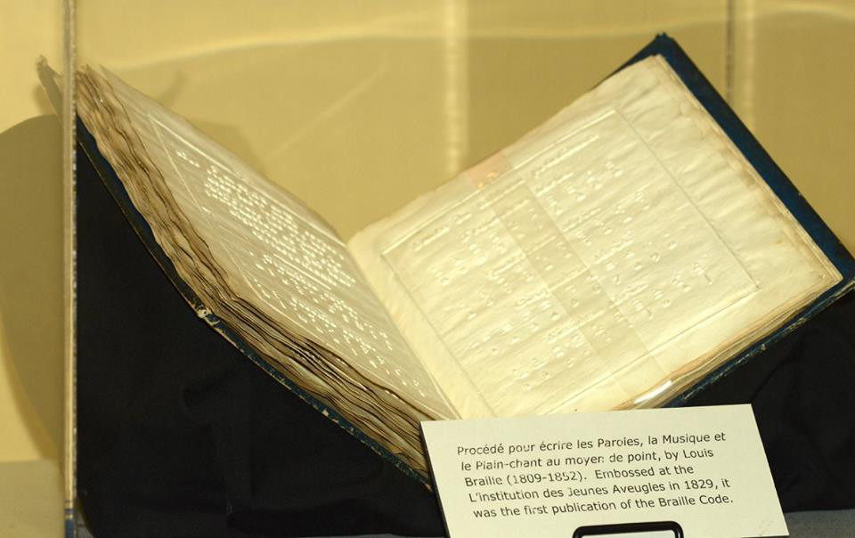 Louis Braille's book: Proc�d� pour �crire les Paroles, la Musique et le Plain-chant au moyen de point, on display in the APH Museum